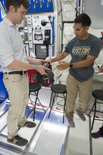 Boeing trainers conduct simulations inside the Boeing Exploratio