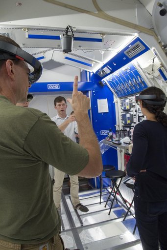 Boeing trainers conduct simulations inside the Boeing Exploratio