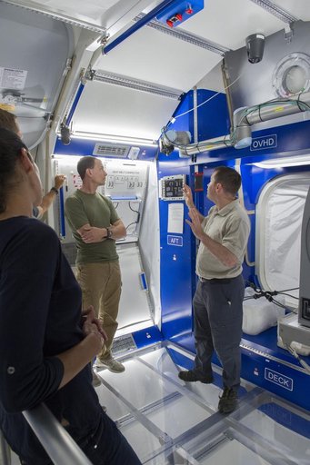 Boeing trainers conduct simulations inside the Boeing Exploratio