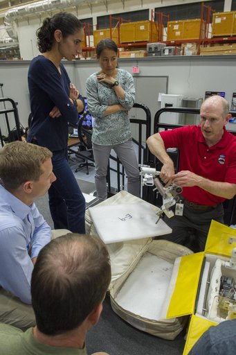 Boeing trainers conduct simulations inside the Boeing Exploratio