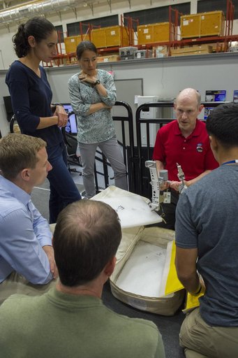 Boeing trainers conduct simulations inside the Boeing Exploratio