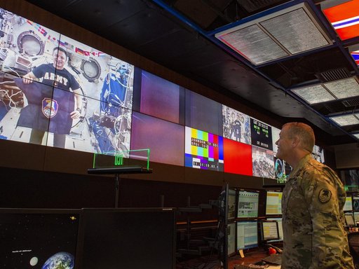 Army Lt. Gen. James Dickinson, right, commanding general of the