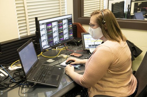 Crystal Klemmer, an Aerodyne Industries engineer at Marshall, monitors the Crew-1 launch from the mission control room in Marshall’s Huntsville Operations Support Center.