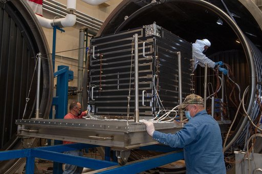 Removal of hot box containing NEA Scout spacecraft from Thermal Vacuum Chamber V15   1 of 2