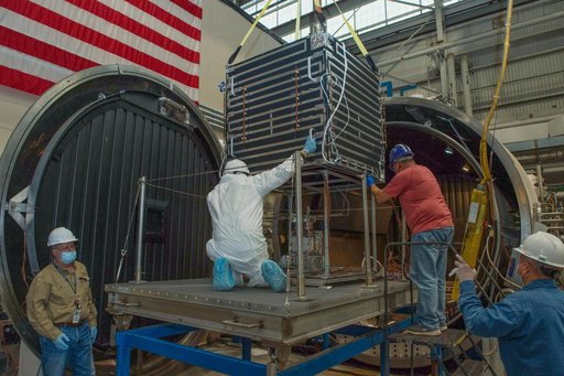 Opening Thermal Vacuum Chamber V15 to extract hot box 2 of 2containing NEA Scout spacecraft.