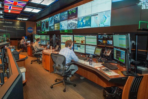 A look inside the International Space Station Payload Operations Integration Center at NASA’s Marshall Space Flight Center in Huntsville, AL.  The POIC team supports science operations on the International Space Station 24 hours a day, 7 days a week. For more than 20 years the POIC team has worked w