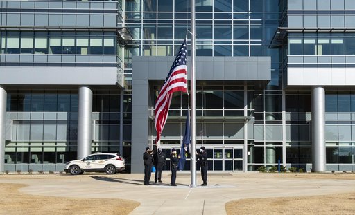 NASA Marshall Raises Flag at New Headquarters Building