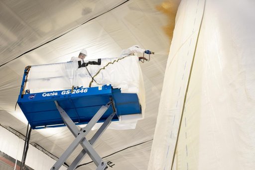 Technicians Apply Thermal Protection Material to NASA Moon Rocket Hardware