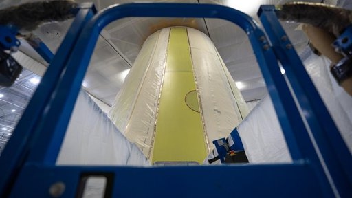 Technicians Apply Thermal Protection Material to NASA Moon Rocket Hardware