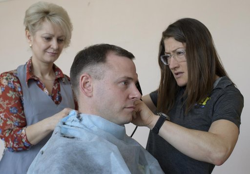 Expedition 59 Crew Haircuts
