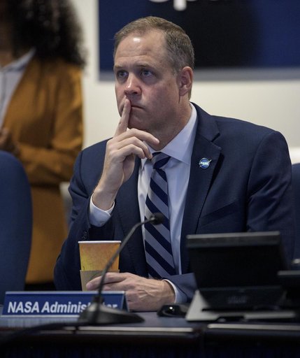 NASA Leadership and Members of Congress watch First All-Woman Sp