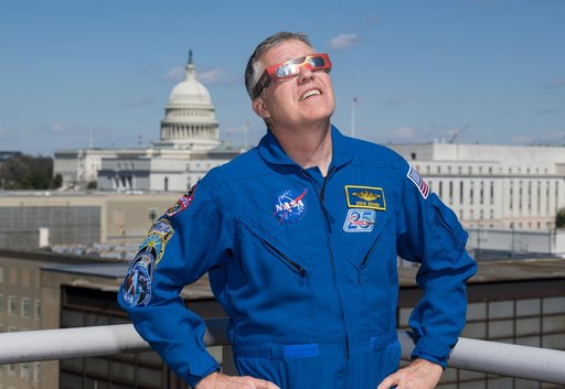 Expedition 69 Crew Wears Solar Eclipse Glasses