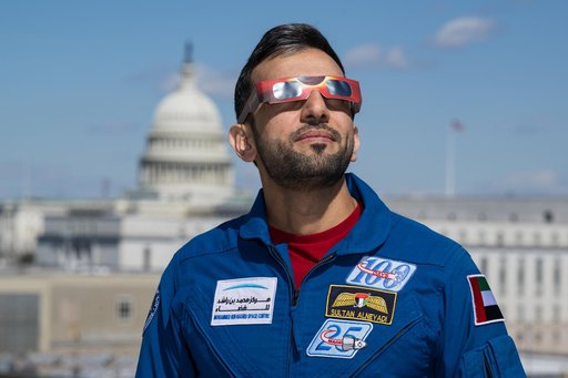 Expedition 69 Crew Wears Solar Eclipse Glasses