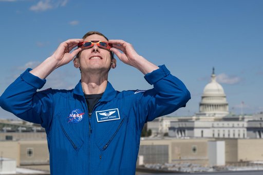Expedition 69 Crew Wears Solar Eclipse Glasses