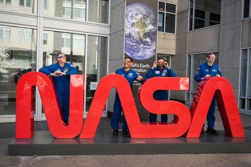 Expedition 69 Crew Wears Solar Eclipse Glasses