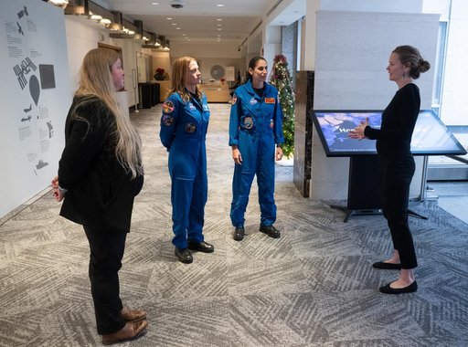 Expediton 70 Astronauts visit Earth Information Center