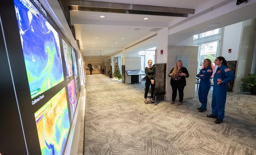 Expediton 70 Astronauts visit Earth Information Center