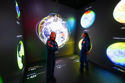 Expediton 70 Astronauts visit Earth Information Center