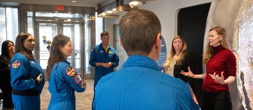 Expedition 71 Astronauts Visit Earth Information Center