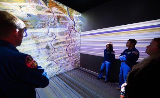 Expedition 71 Astronauts Visit Earth Information Center