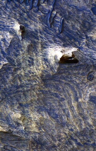 Light-Toned Bedrock Along Cracks as Evidence of Fluid Alteration