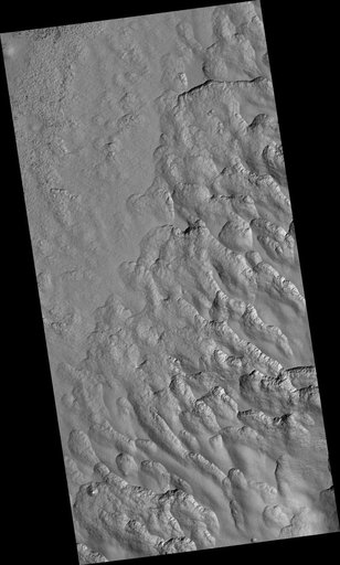 Scalloped Topography in Peneus Patera Crater