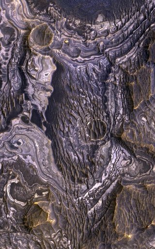 Bright Layered Deposits with Clues of Acidic Water