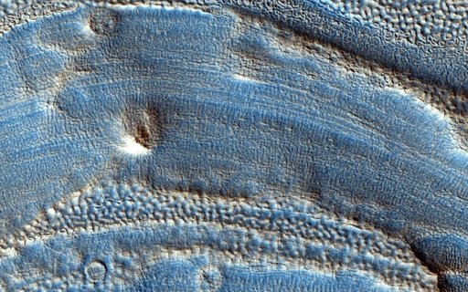 Ice Deposition and Loss in an Impact Crater in Utopia Basin