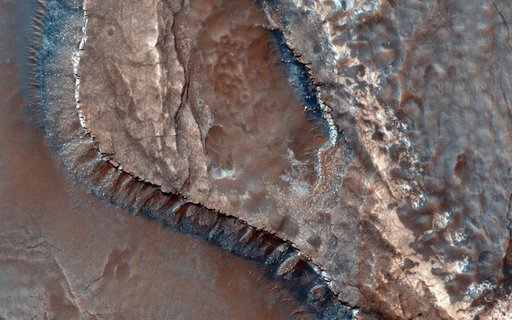 A Channel System and Patterned Ground near Hellas Basin