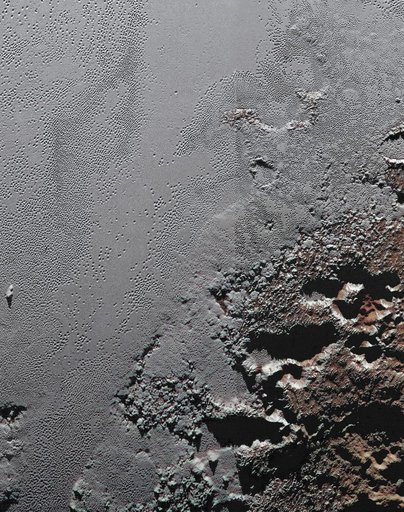The Jagged Shores of Pluto Highlands