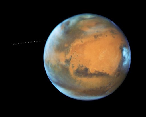 NASA's Hubble Sees Martian Moon Orbiting the Red Planet
