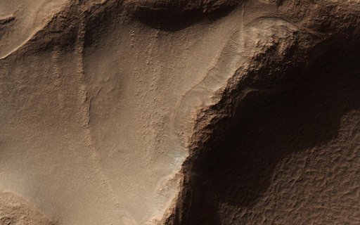 Honeycomb-Textured Landforms in Northwestern Hellas Planitia