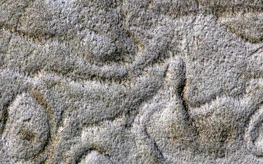 Curving Ridges and Pits