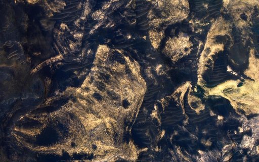 Jumbled Blocks on the Floor of Melas Chasma