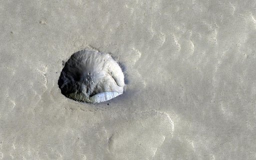 Icy Cliffs and Impact Craters