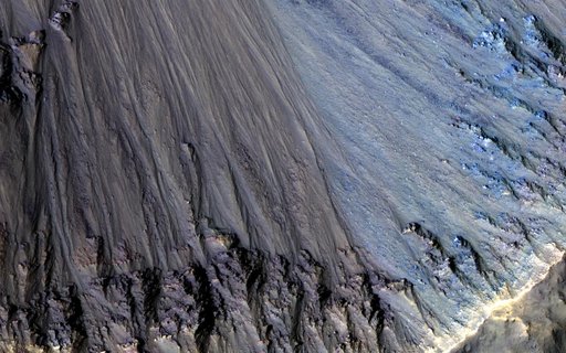 Colorful Rocks Exposed in a Fresh Impact Crater