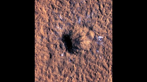 HiRISE Views a Mars Impact Crater Surrounded by Water Ice