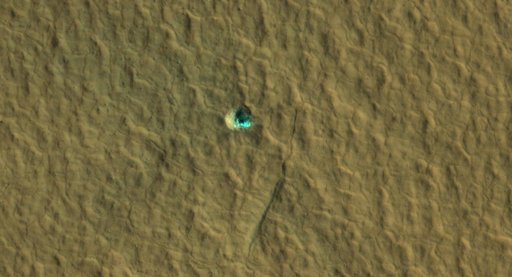 Ice-Exposing Impact Crater Surrounded by Polygon Terrain