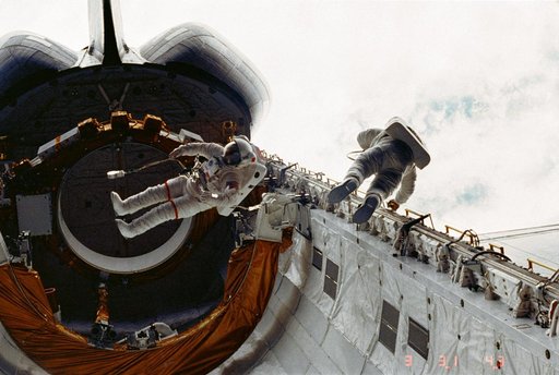 MS Peterson and MS Musgrave in payload bay (PLB) during EVA