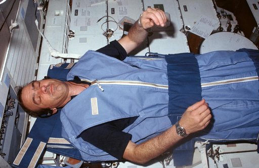 Mission Specialist (MS) Fabian sleeps on middeck