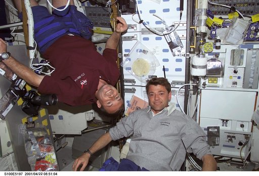 Pilot Ashby and MS Lonchakov pose on the middeck of Endeavour