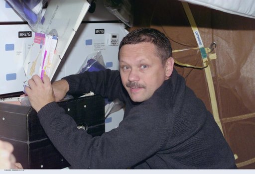 MS Boris Morukov at work aboard Atlantis during STS-106