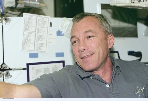 Commander Wilcutt at work aboard Atlantis during STS-106