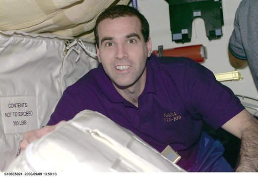 MS Richard Mastracchio at work aboard Atlantis during STS-106