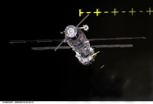 Distant view of the ISS as OV-104 makes its initial approach during STS-106