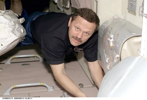 MS Morukov prepares Zvezda for habitation during STS-106