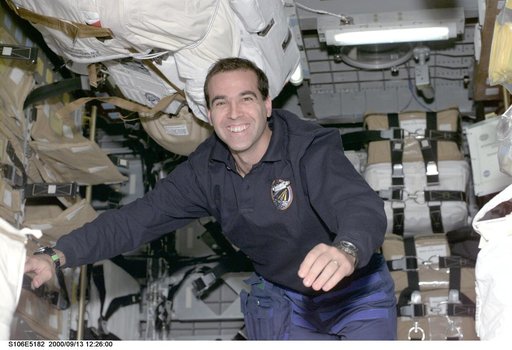 MS Mastracchio works with stowage equipment in SpaceHab during STS-106