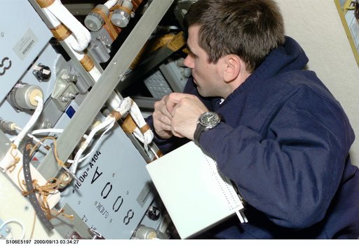 MS Malenchenko conducts electrical work in Zvezda during STS-106