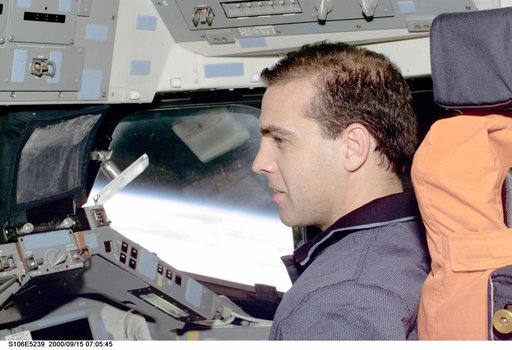 MS Mastracchio works at the pilot's workstation in Atlantis during STS-106