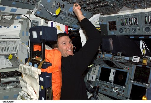 Husband seated in the CDR's seat on Columbia's FD during STS-107